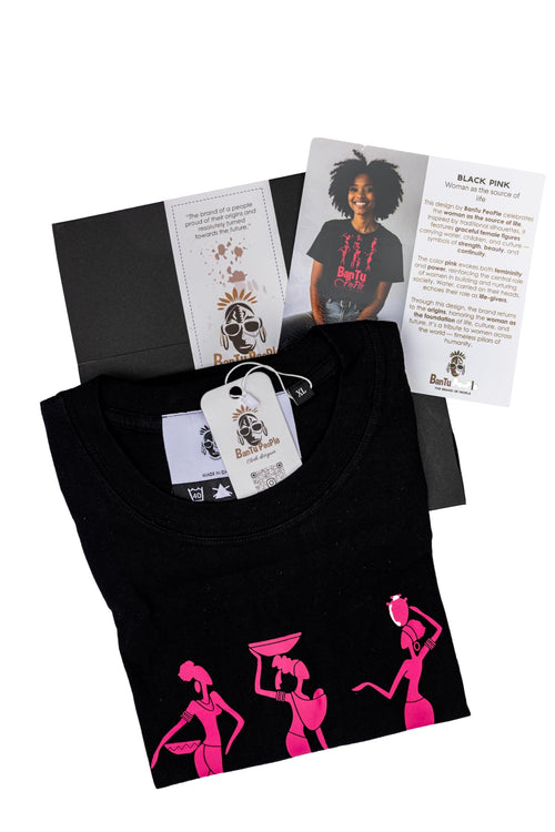 Black t-shirt with pink graphics, packaging, and tags on a white background